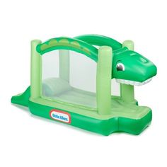 an inflatable bouncer with a green alligator on it