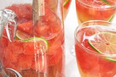 watermelon and lime drink in pitcher with glasses