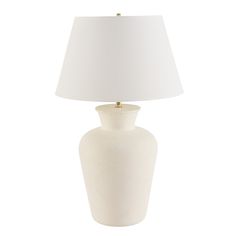 a white lamp with a gold base on a white background, it looks like something from the past