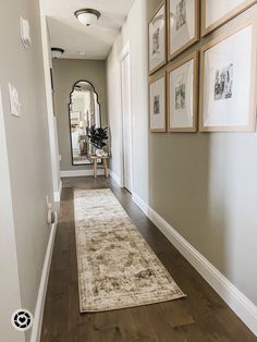 the hallway is clean and ready for us to use as an entrance way in this home