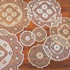 an old doily is laying on the floor