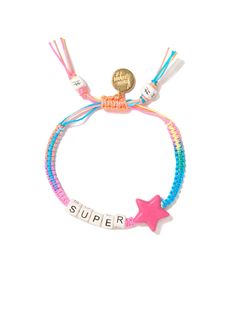 a bracelet with the word super written on it and a pink star in the middle