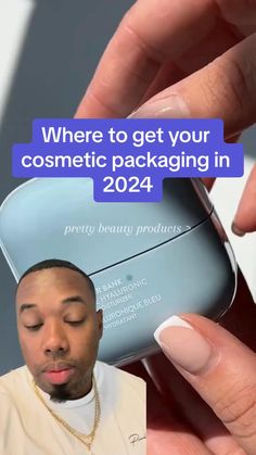 a person holding a cell phone with the text where to get your cosmetic packaging in 2014
