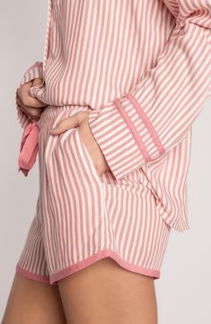 A notched collar and long sleeves frame these sateen jammies covered in dreamy stripes. 25" top length; 2 1/2" inseam; 25" leg opening; 10 1/2" front rise; 14 1/2" back rise (size Medium) Top has notched collar; long sleeve Shorts have drawstring waist 100% rayon Machine wash, dry flat Imported Rust Fabric, Short Pajamas, Pajama Fashion, Cute Pajama Sets, Long Sleeve And Shorts, Striped Pyjamas, Cute Pajamas, Favorite Movie, Short Pajama Set