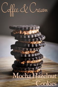 a stack of cookies sitting on top of a wooden table