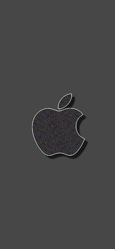 an apple logo is shown on a gray background with black and white speckles