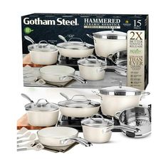 the gotham steel hammered cookware set is in its box and ready to be used