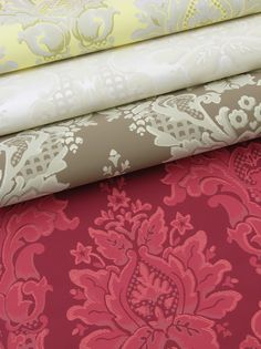 four different colored wallpapers are stacked on top of each other in various patterns