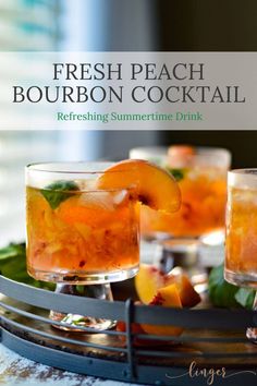 fresh peach bourbon cocktail on a tray