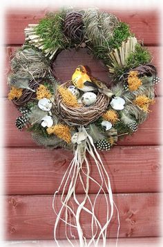 a bird nest on top of a wreath