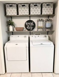 a washer and dryer sitting in a laundry room next to eachother