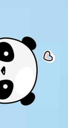 a panda bear is flying through the air with a heart shaped object in its mouth