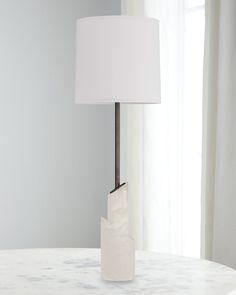 The Willa Lamp serves up functionality with an edge. Scaled for a buffet, but ideal in any area calling for a slimmer profile, the luxuriously appointed lamp is designed with a gently tapered shade and post in a glossy, dark, English bronze finish. Contrasted by offset, alabaster discs that are cut at an angle to form the base.    Finish will vary    Handcrafted of steel and alabaster with a cotton shade     Uses one 60watt type A bulb     Approx. 12"Dia x 34"T     Lampshade Dimensions: 11"L x 1 Lamps, Buffet Lamps, Design, Type A, Bronze Finish, Neiman Marcus, Cleaning Wipes, Tops Designs, Luxury Fashion