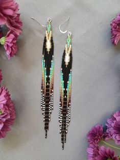 the earrings are made from seed beads