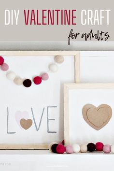 valentine's day craft for adults with hearts and pom poms hanging on the wall