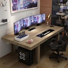 a computer desk with three monitors on it