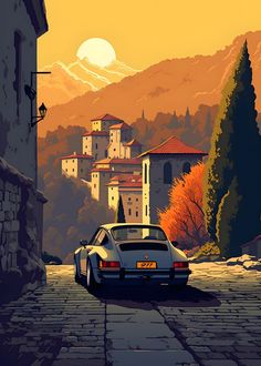 a car parked on the side of a road in front of a mountain range with houses