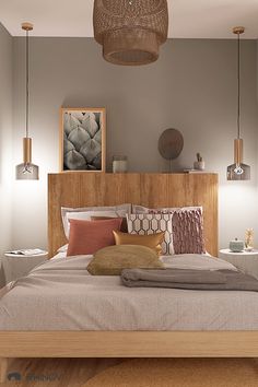 a bed room with a neatly made bed and two pictures on the wall above it