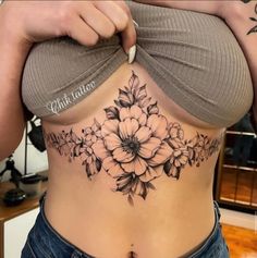 Stomach Flower Tattoos Women, Bigger Tattoo Ideas, Vertical Stomach Tattoos, Cute Women Tattoo Ideas, Upper Stomach Tattoos Women, Stomach Tats For Women, Womens Thigh Tattoo, Black Woman Tattoo Ideas
