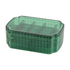 a green plastic container with dividers on the bottom and sides, for storing items