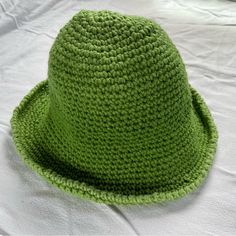 Crocheted By Me! 100% Acrylic Yarn Green Crochet Bucket Hat With Slight Ombr Effect Hat Has A Longer Brim With No Definition From Other Parts Of The Hat, So It Can Be Molded To Users Liking! ***Disclaimer: I Am Relatively New At Crochet, And This Was One Of My First Projects. There May Be Slight Imperfections That You Might Not Find In A Store Bought Hat Since It Is Done By Hand By Me! Comment With Questions! Women Accessories, Crochet Bucket, Green Crochet, It Is Done, Crochet Bucket Hat, Ombre Effect, Acrylic Yarn, Bucket Hat, Im Not Perfect