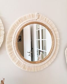 a mirror that is hanging on the wall