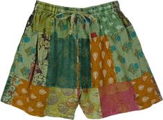 An ethnic floral printed mixed patchwork cotton shorts in savanna green.  These lightweight shorts feature an elastic waistband and a functional drawstring that can be easily adjusted for a comfortable fit. #tlb #Patchwork #Printed #bohemianfashion #Handmade #HippieShorts #BeachShorts Hippie Shorts, Bohemian Shorts, Flowers Brown, Mixed Prints, Patchwork Shorts, Earthy Outfits, Shorts Cotton, Hippie Look, Bohemian Handmade