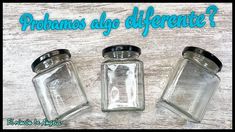 three glass jars sitting next to each other on top of a wooden table with the words probamos ago differente?