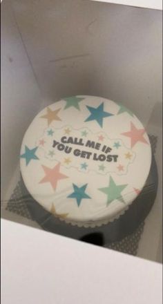 a white cake with stars and the words call me if you got lost