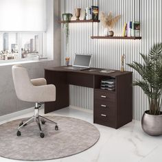 a desk with a laptop computer on top of it next to a potted plant