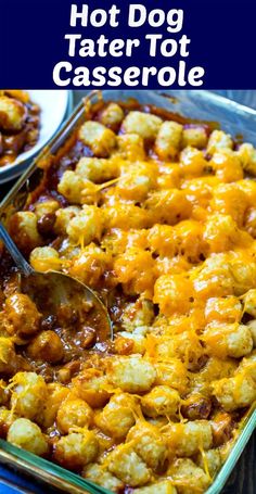 a casserole dish with tater tots in it and a serving spoon