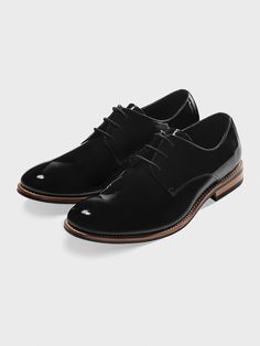 Patent Leather Wood Sole  An updated take on our black patent leather shoes. Beautifully crafted for a sleek, elegant profile. No matter the black tie occasion, this city-smart pair are a sound choice.  Patent Leather Uppers Wood Soles Prom Shoes Guys, Groomsmen Shoes Black, Groom Shoes Black, Groom Shoes Wedding, Black Formal Shoes Men, Grooms Shoes, Slytherin Uniform, Groomsmen Shoes, Wedding Shoes Men