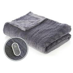 a gray blanket with a computer mouse on the bottom and an image of a white background