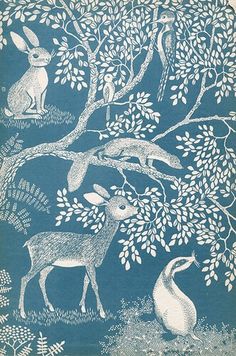 an old book with animals and trees on it