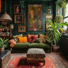 a living room filled with lots of green furniture and paintings on the wall above it