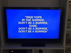 a television screen with the words high tops in front of it and an image of a bummer