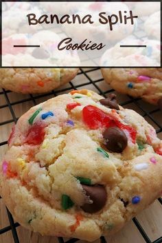 cookies with chocolate chips and sprinkles sitting on a cooling rack next to the words, banana split cookies