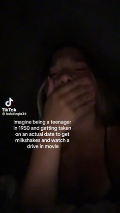 a woman covering her face with her hands while sitting in the dark text reads, imagine being a teenager in 1950 and getting taken