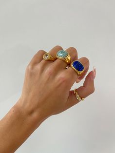 Chunky Gold Gemstone Ring - This beautiful and bold 18k gold agate ring makes for a perfect statement piece to add to your jewelry collection. Its thick and chunky design makes for an eye-catching accessory that is sure to turn heads.  Details: - Stainless Steel and 18k Gold - Blue or green agate stone - Hypoallergenic - Will not turn skin green! - Style: Minimalist WHY VASI Jewelry? - Ethically sourced gems and stones - Made with recycled gold - Handmade or designed/sourced - Shop local (based Chunky Ring With Stone, Vintage Statement Rings, Chunky Gemstone Rings, Gold Rings Chunky, Colorful Gold Jewelry, Chunky Gold Rings Aesthetic, Gem Rings Stones, Bulky Rings, Chicago Beats