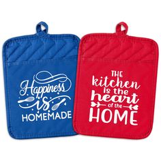 two oven mitts with the words happiness is the heart of the home