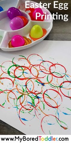 an easter egg painting with colored eggs in the background