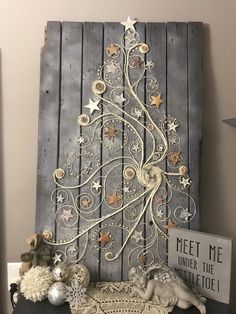 a christmas tree made out of wood and metal