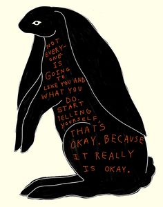 a drawing of a black rabbit with words written on it