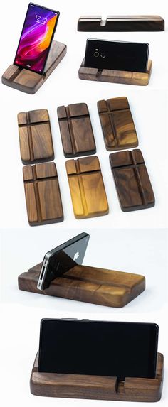 several different types of cell phones are arranged on wooden trays with one phone in the middle