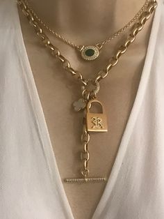 This personalized necklace features a gold plated stainless steel padlock with your choice of one initial in CZ old English font(choose at the checkout). Mother of pearl clover and CZ toggle chain drop add a modern twist to this necklace. Oval link chain is gold plated over stainless steel. Drop toggle length is approximately 3 inches. Necklace length is adjustable 16-18 inches.  🎁All orders are shipped in a box. Gift messages are attached to the box. Los Angeles, Initial Gold Necklace, Homemade Jewellery, Charm Holder Pendant, English Font, Old English Font, Padlock Necklace, Talisman Necklace, Floating Necklace