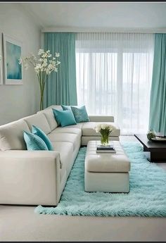 a living room with blue and white decor