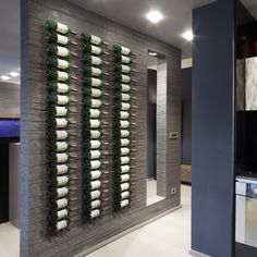 a wine rack filled with lots of bottles