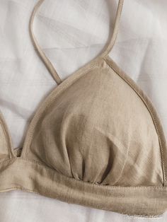 Linen soft bra designed with elastic band instead of traditional hook & eye set, so you do not have any unhooking bra problems. That makes you elegant and beautiful. Double layer of linen keeps the form and covers your nipples allows it to be worn under different kind of tops. . No seams were left inside the bra in order to prevent pressure and make this bra even gentler on your skin. Please see our color chart to choose your favorite color. DETAILS: - Adjustable straps - Elastic band - Colo All Natural Clothing, Linen Bra Top, Bras And Things, Linen Bra Pattern, Linen Clothing Patterns, Sewing Linen Clothes, Linen Swimsuit, Linen Clothes Summer, Linen Lingerie