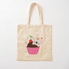a tote bag with an image of a cupcake and a koala on it