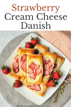 strawberry cream cheese danish on a white plate with strawberries next to it and the title overlay reads, strawberry cream cheese danish
